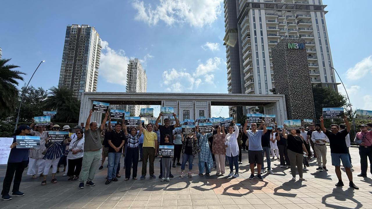 Residents came together carrying placards and banners to demand accountability, transparency, and strict legal compliance in the management of their community.
